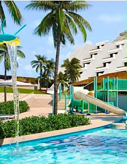 Children's water slide and splash pool at Paradisus Cancún
